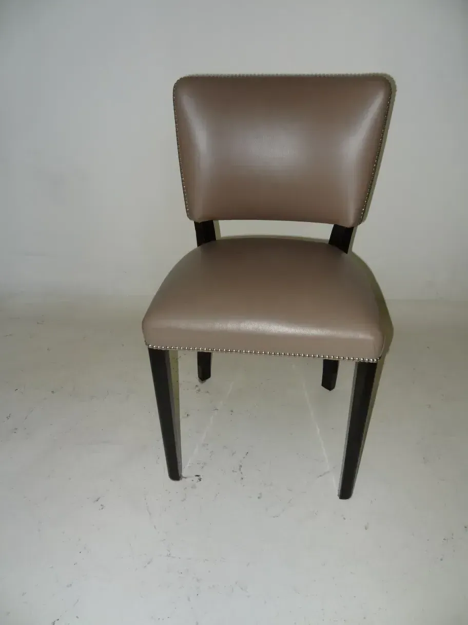 Top view of 12 antique chairs in a light environment