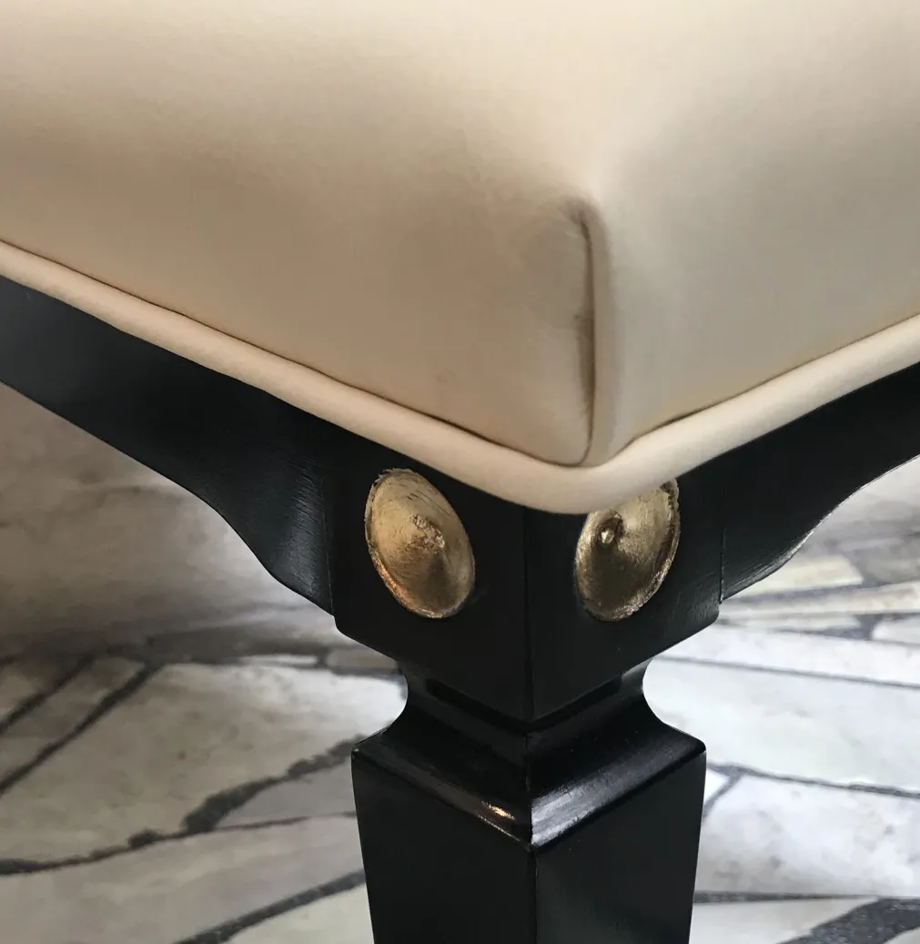 12 antique jansen chairs with gold details in an elegant setting