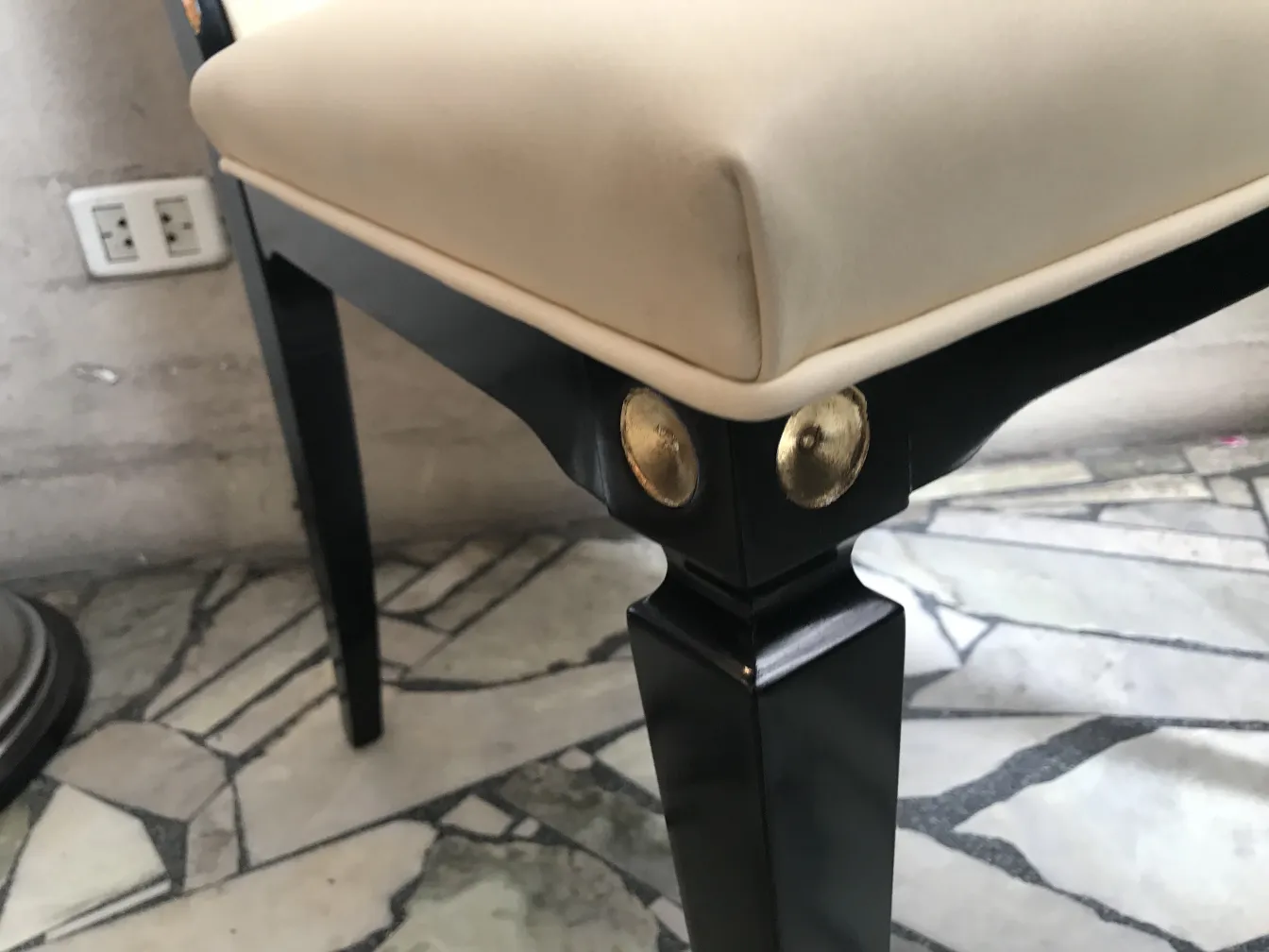 Close-up of 12 antique chairs jansen with golden finishes in an elegant setting.