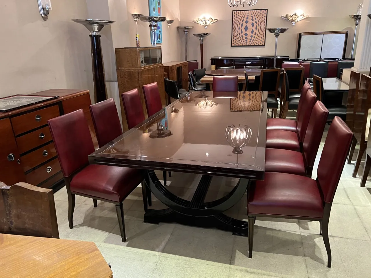 twelve vintage chairs in a stylish dining setup