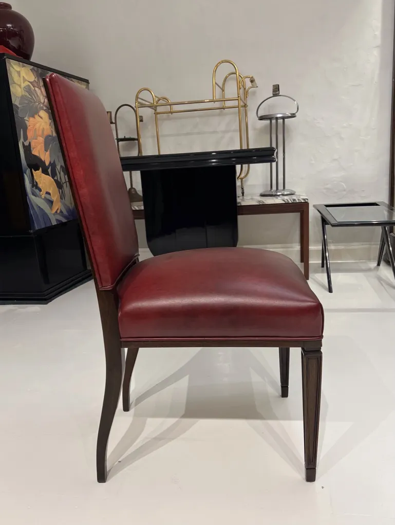 Antique burgundy chairs in a decorative environment