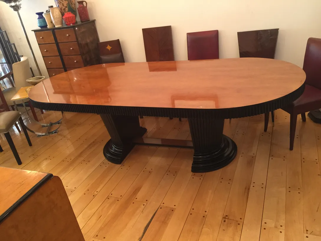 12 antique chairs in a modern setting.