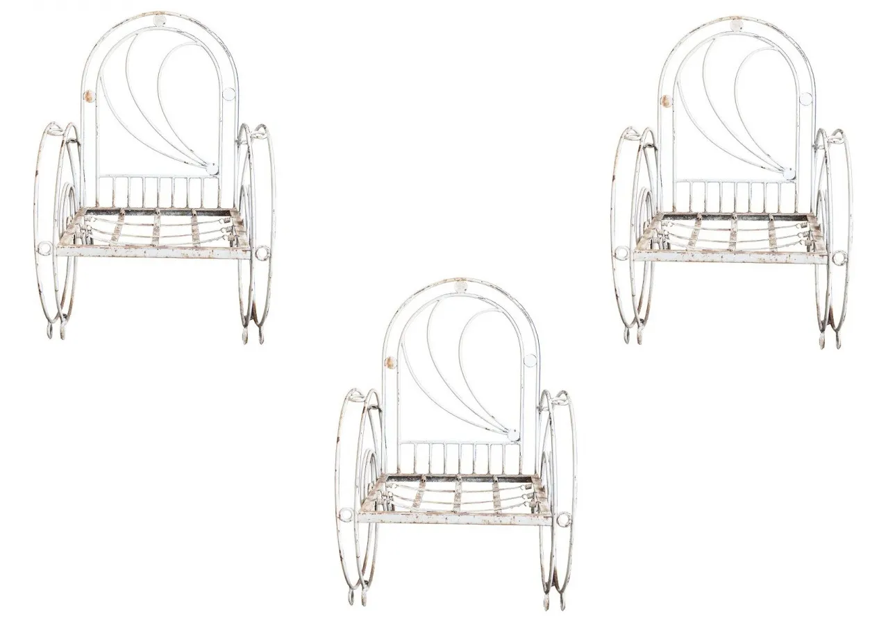 3 antique garden armchairs with unique design, set in a natural environment