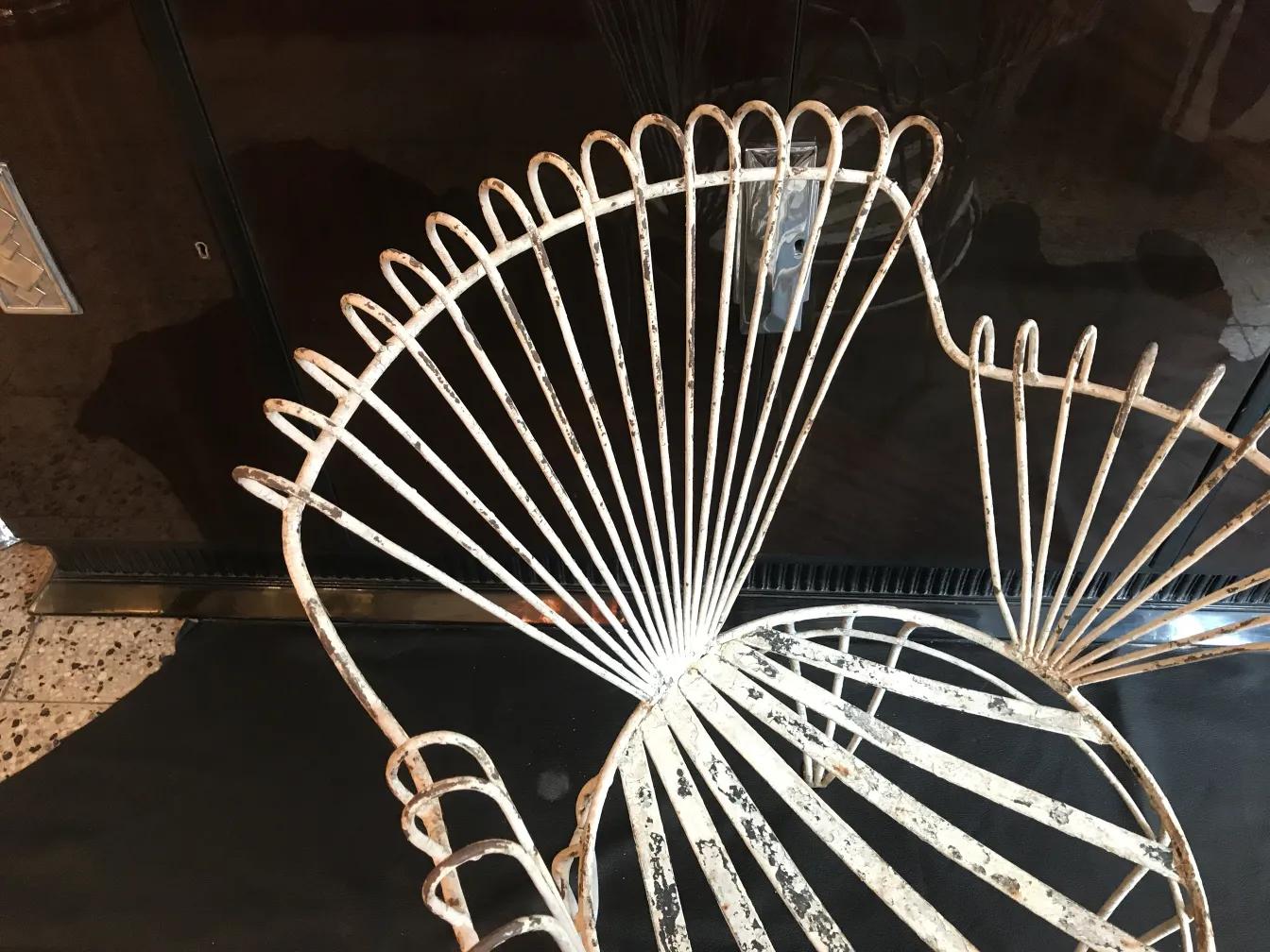 Detailed view of 4 antique garden armchairs, elegant structure