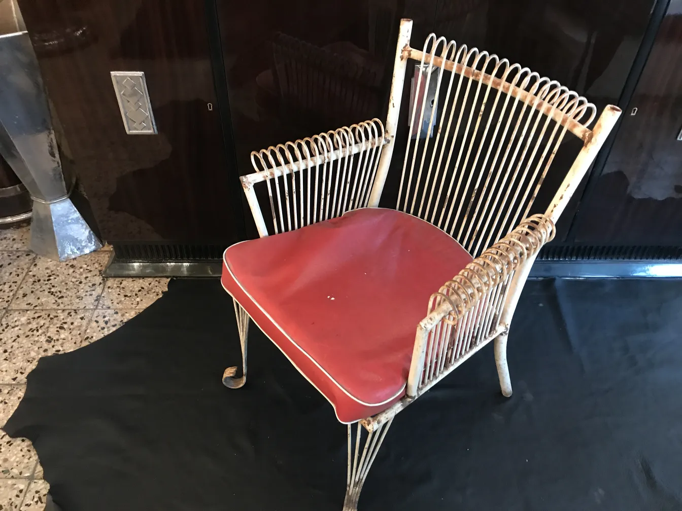 four antique garden armchairs with red cushions