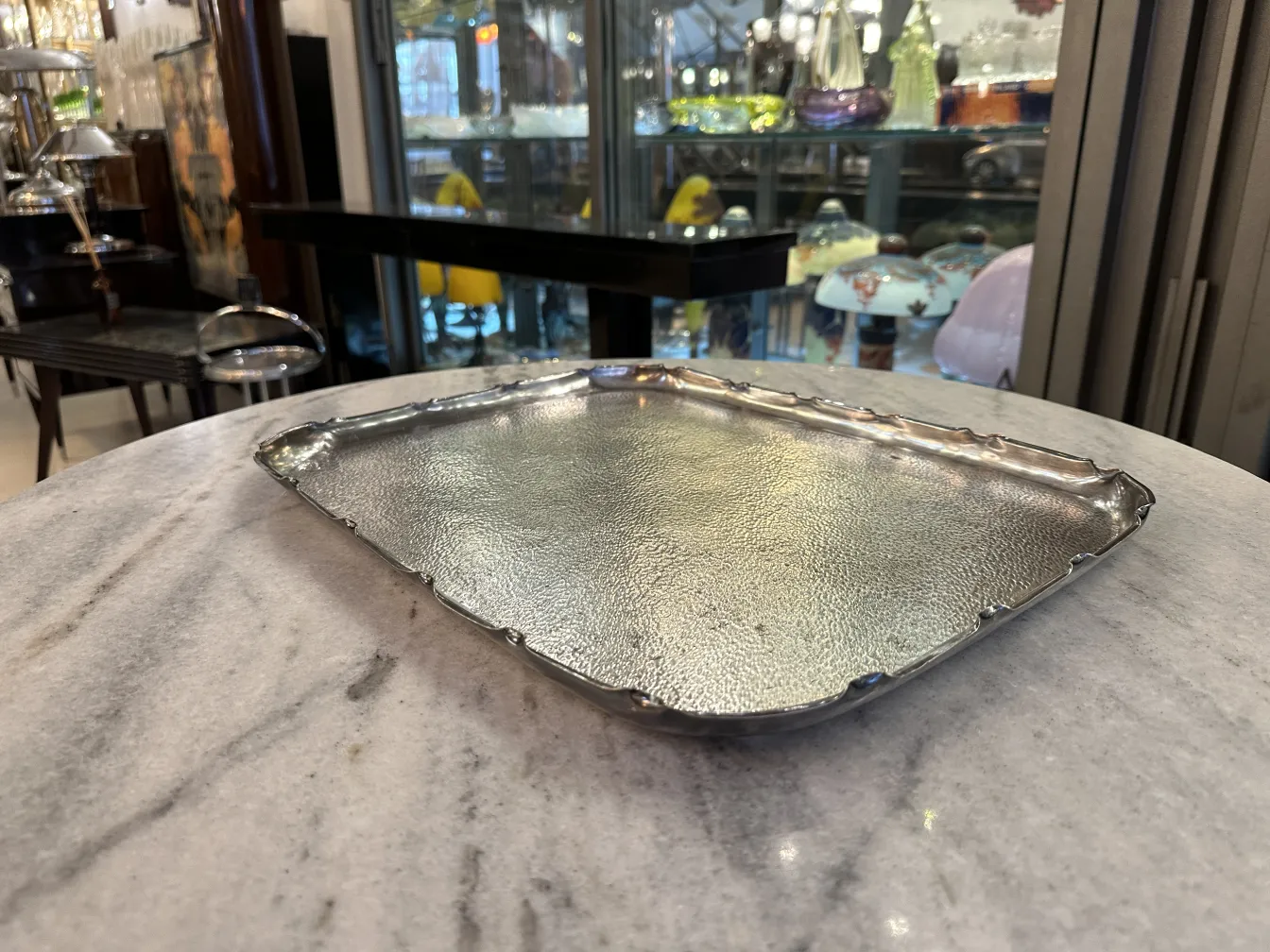 antique tray with decorative edges on table