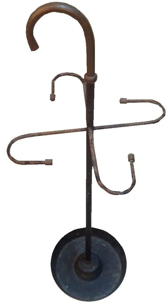 antiguo paraguero decorativo con base redonda