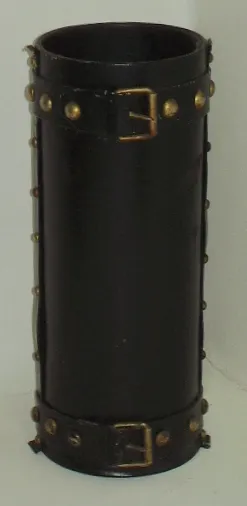 paragüero antiguo con detalles dorados, elegante diseño cilíndrico