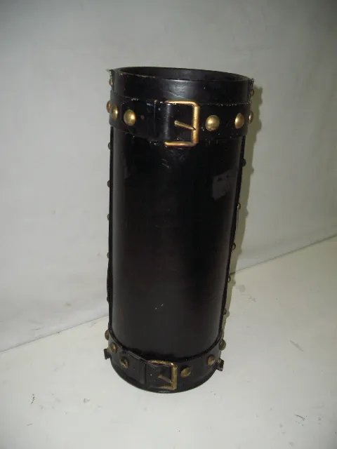 antique umbrella stand with elegant decorative details