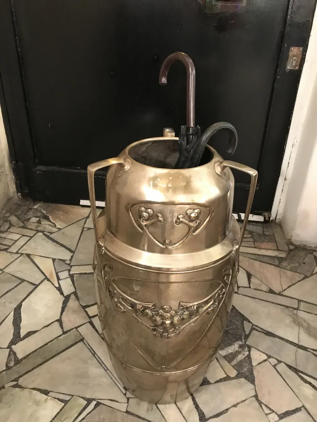 antique umbrella stand with kayser design