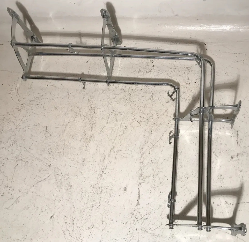 antique coat rack featuring hooks at varied heights