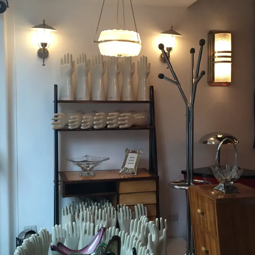 Antique wall coat rack with unique design in a cozy setting