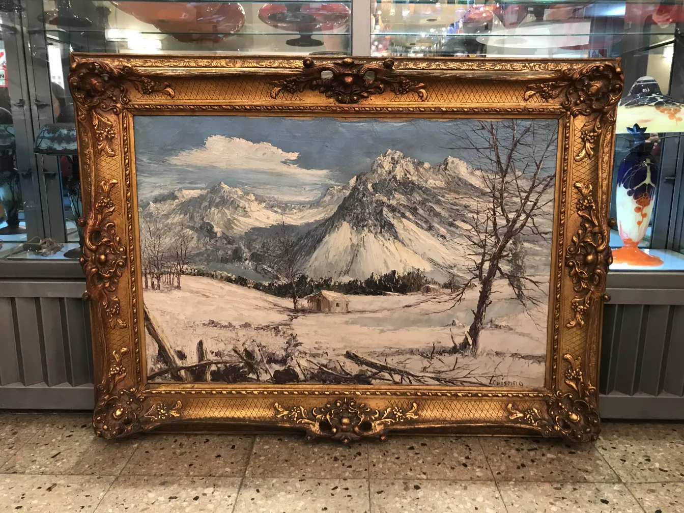 Pintura antiga de Luis Crispino mostrando montanhas nevadas.