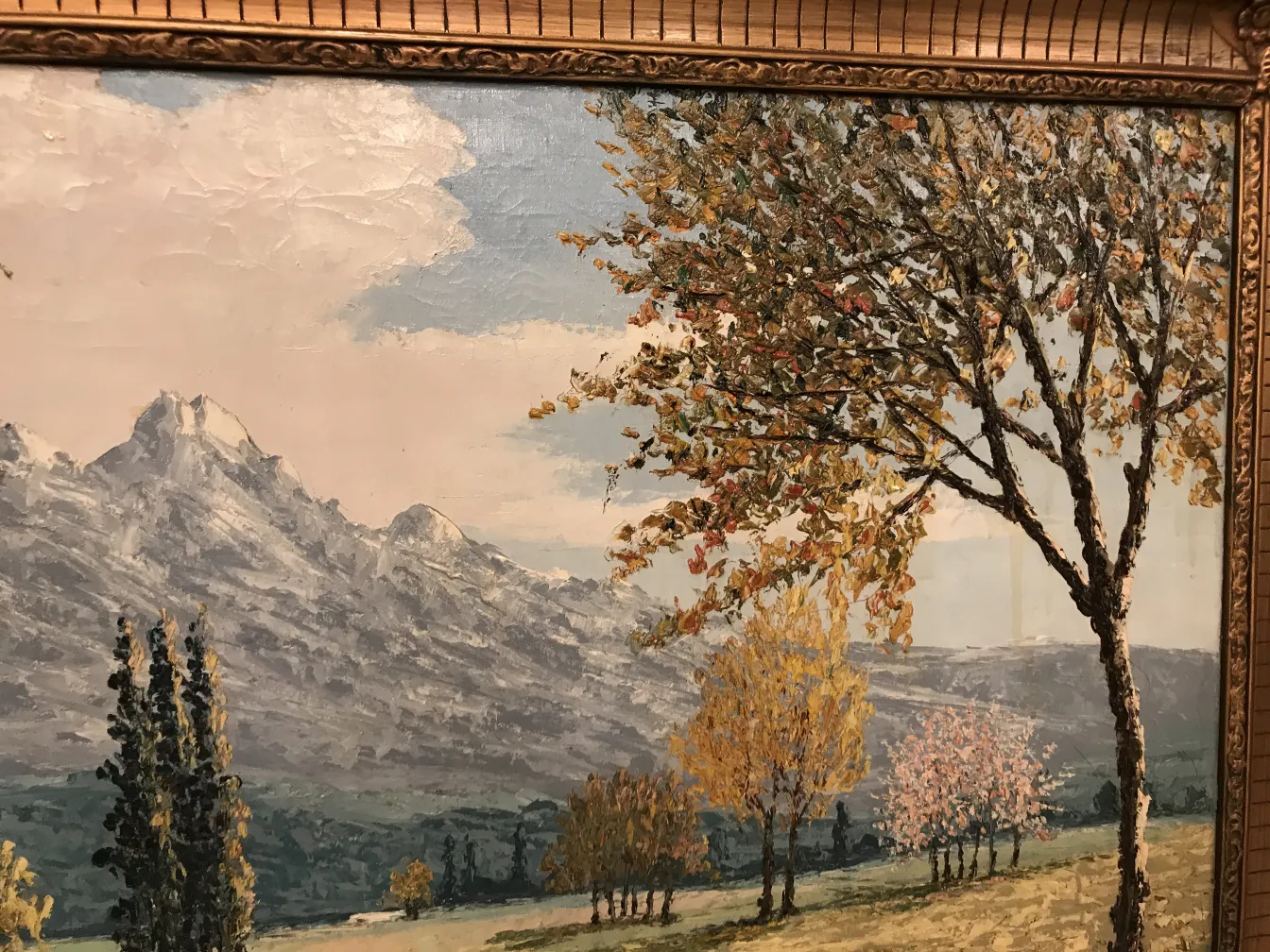 Peinture Crispino antique avec des arbres colorés et des montagnes.