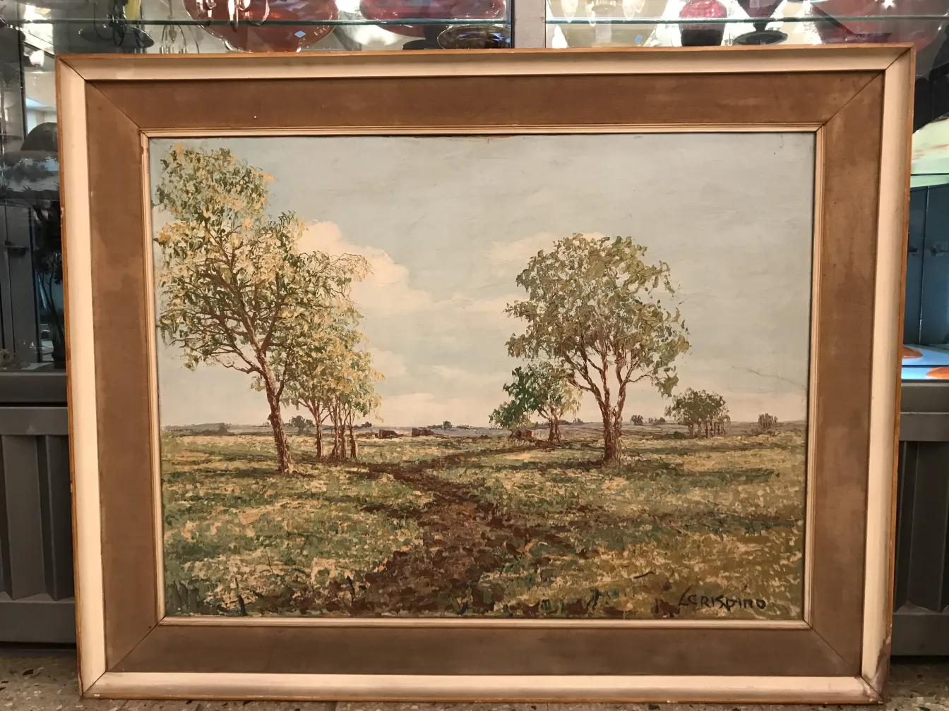Pittura antica di Crispino che mostra un paesaggio con alberi.