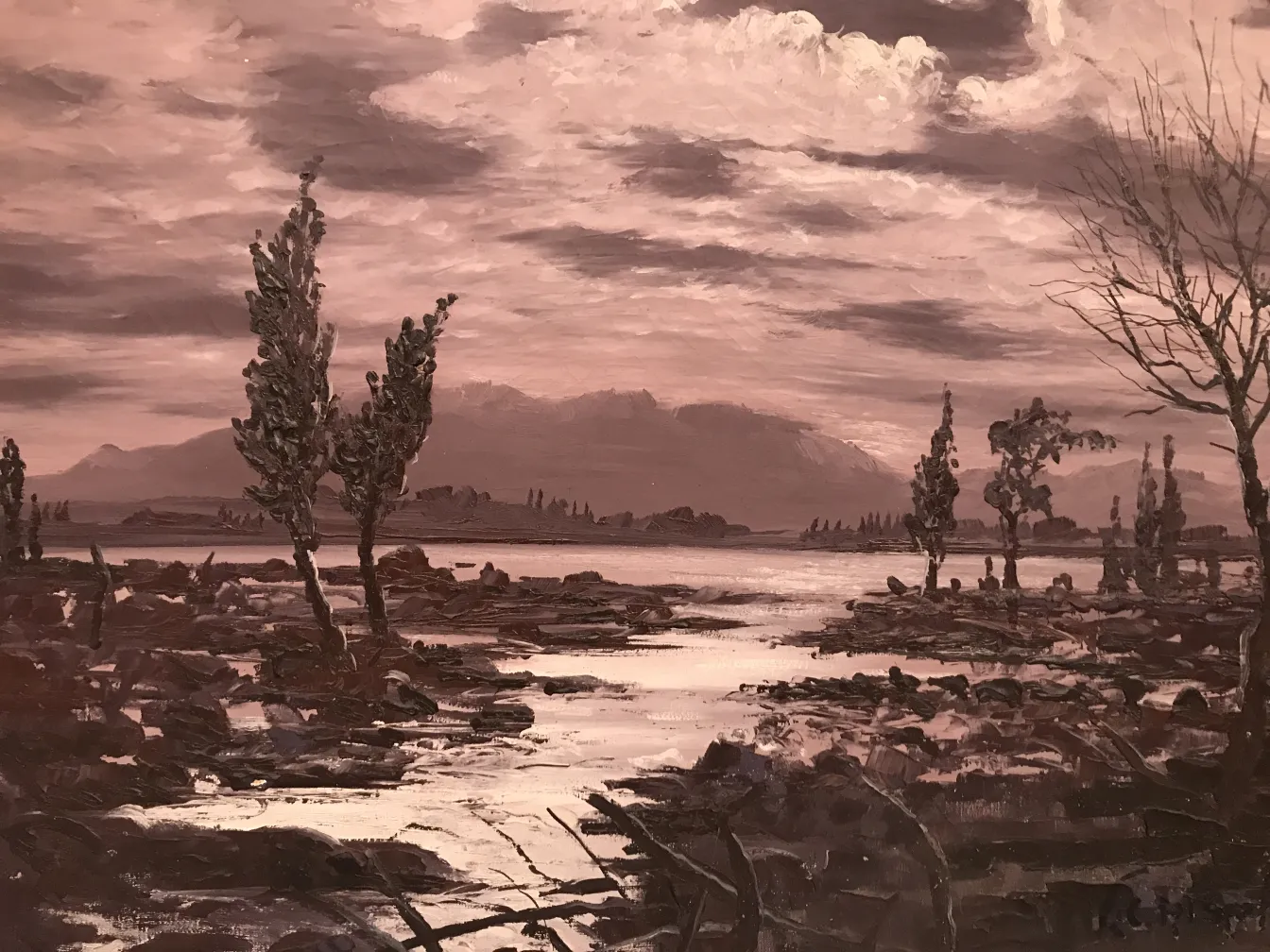 paisagem em tons de marrom com árvores e um lago