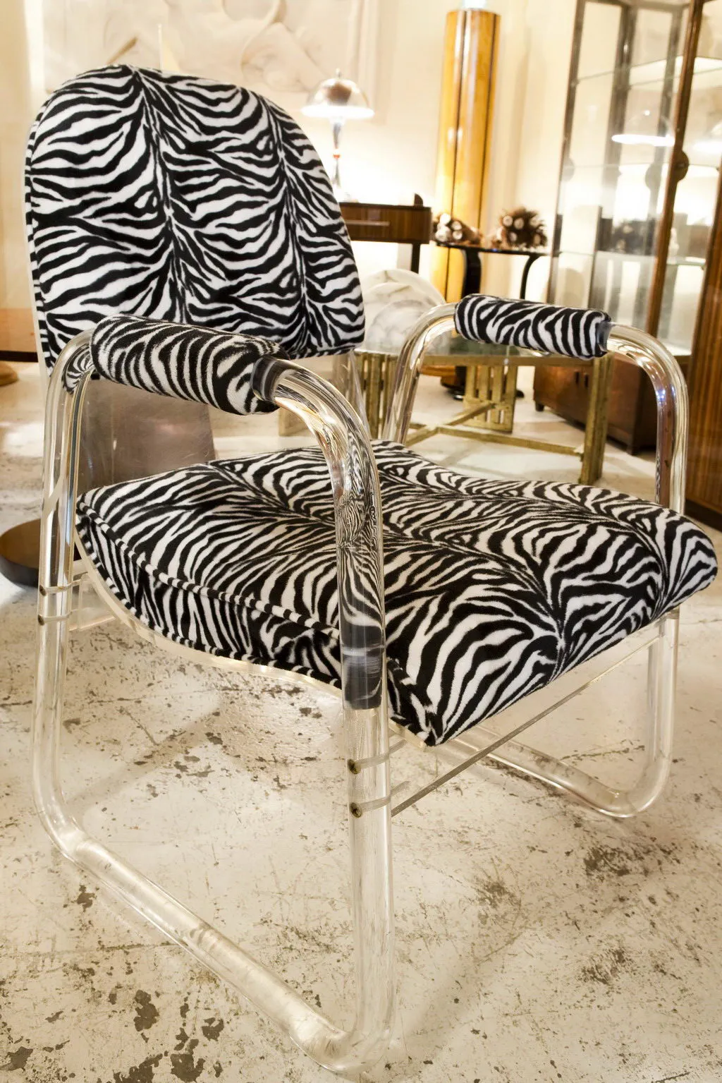 Antique armchairs with zebra pattern in a vintage setting
