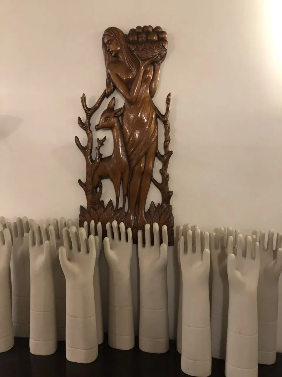 Antique wall plate Zadra featuring a figure and deer.