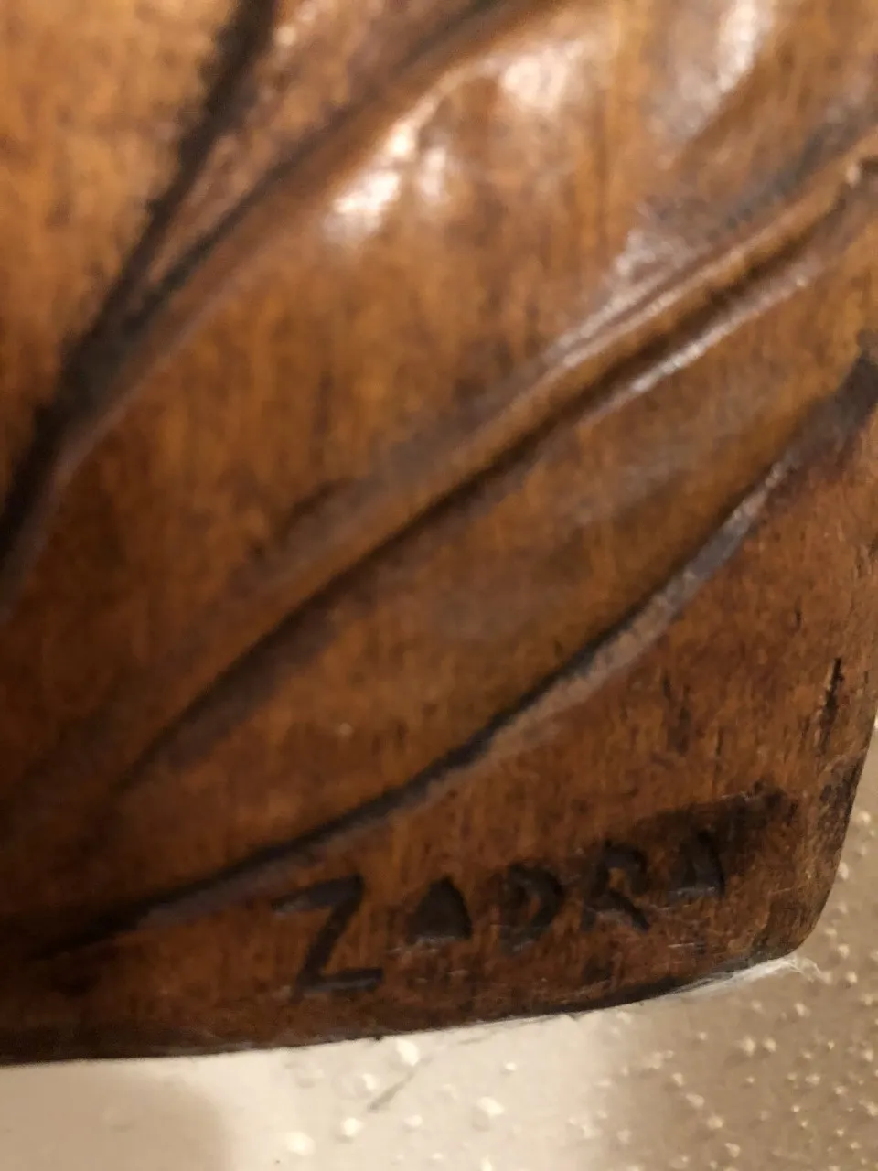 Antique wall plate featuring Zadra signature.