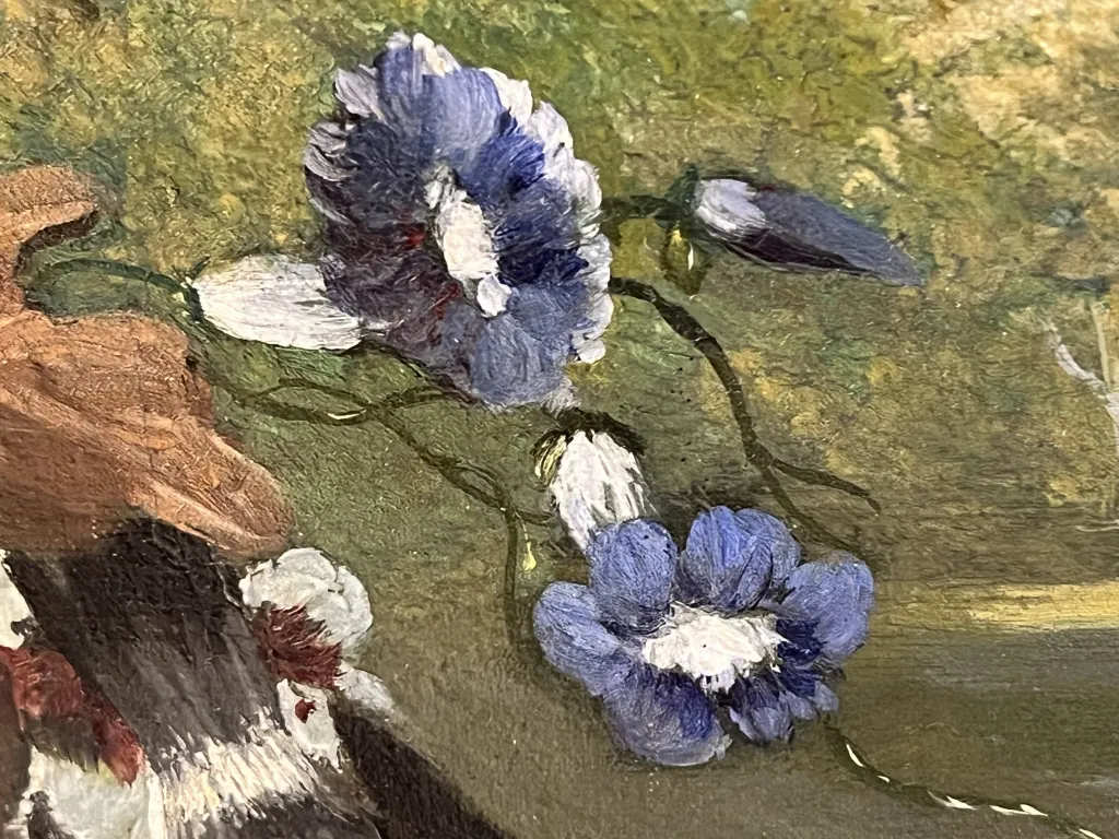pintura antiga com flores azuis em um cenário natural