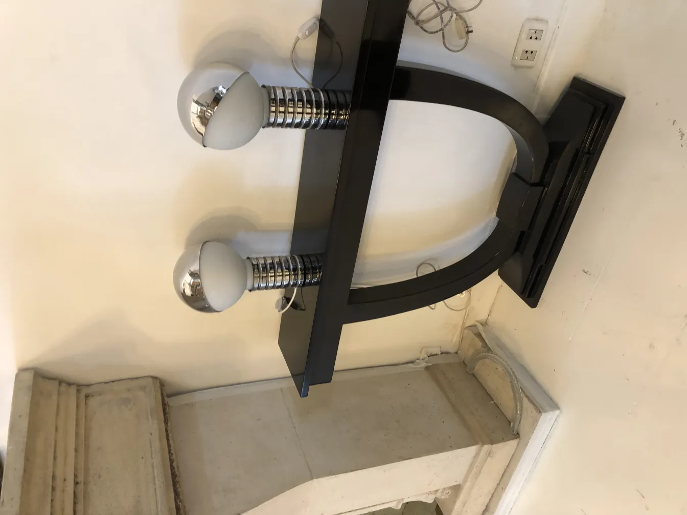 2 antique table lamps with shiny globes, elegant setting