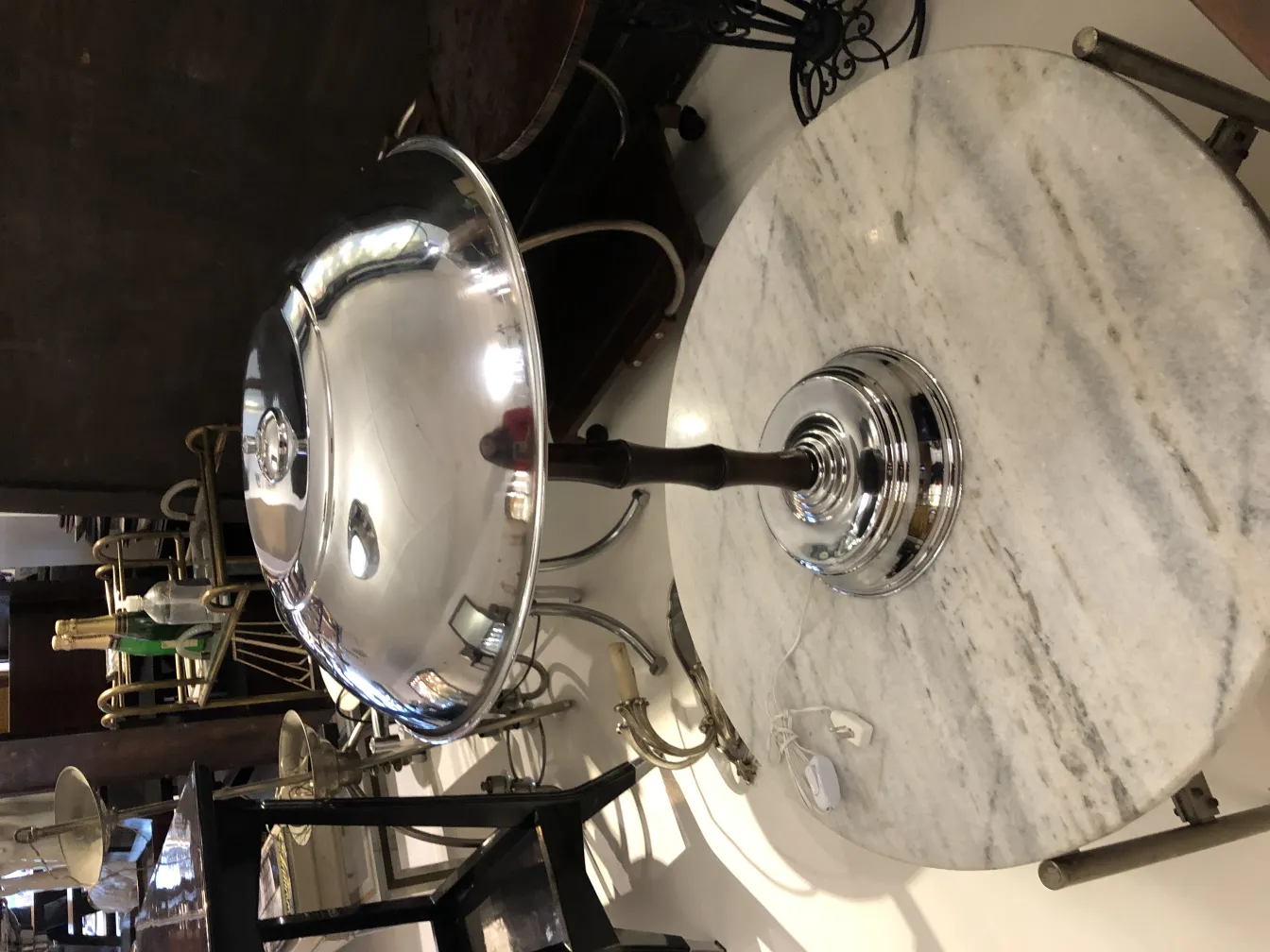 Two elegant antique table lamps in a classic setting