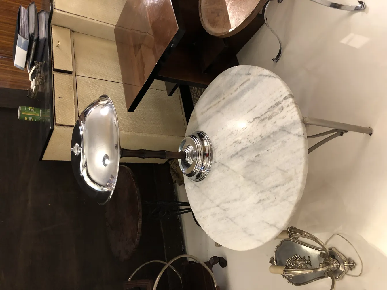 2 antique table lamps and tables in a cozy setting.