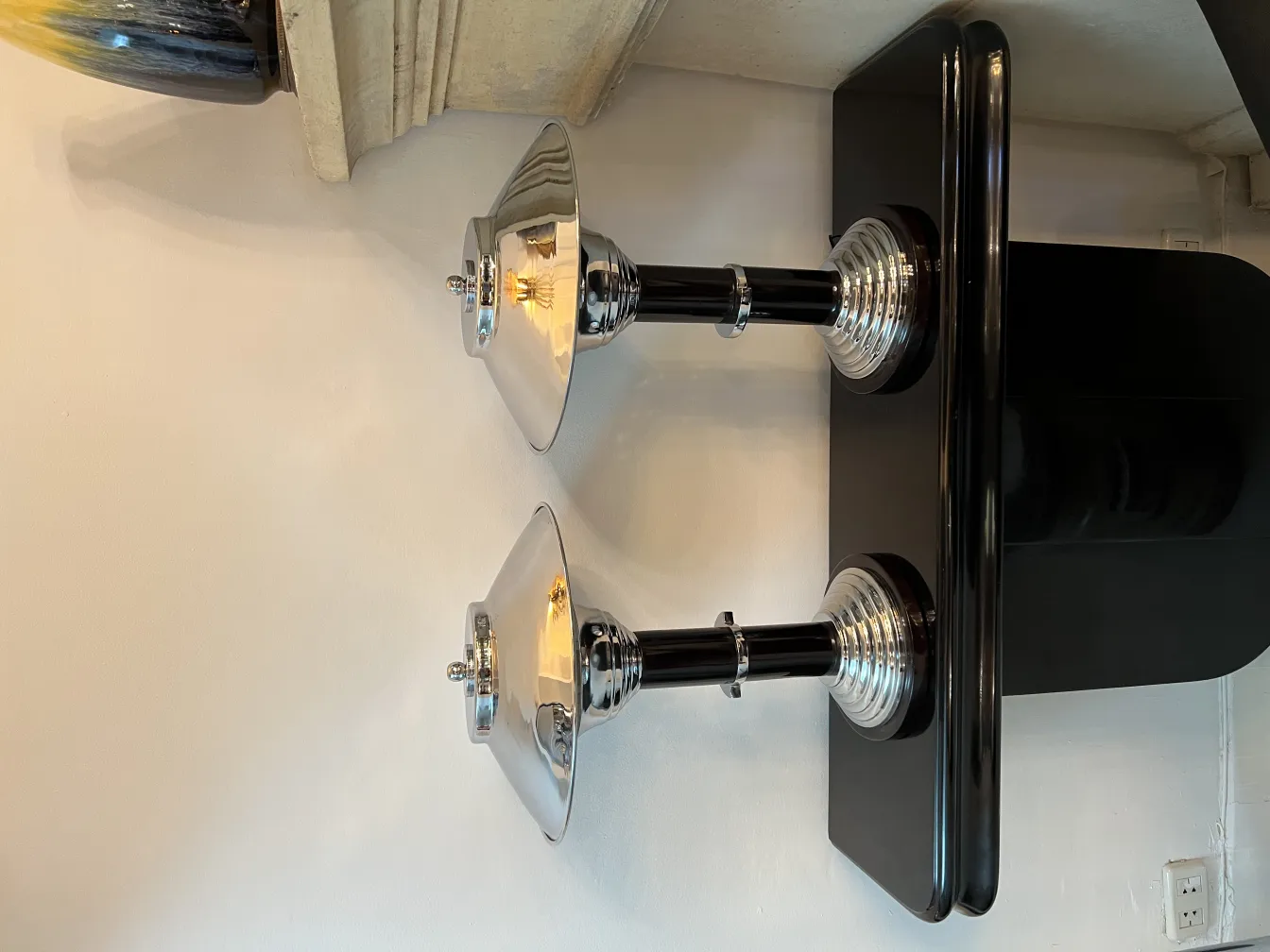 two antique table lamps with an elegant design in a decorative setting