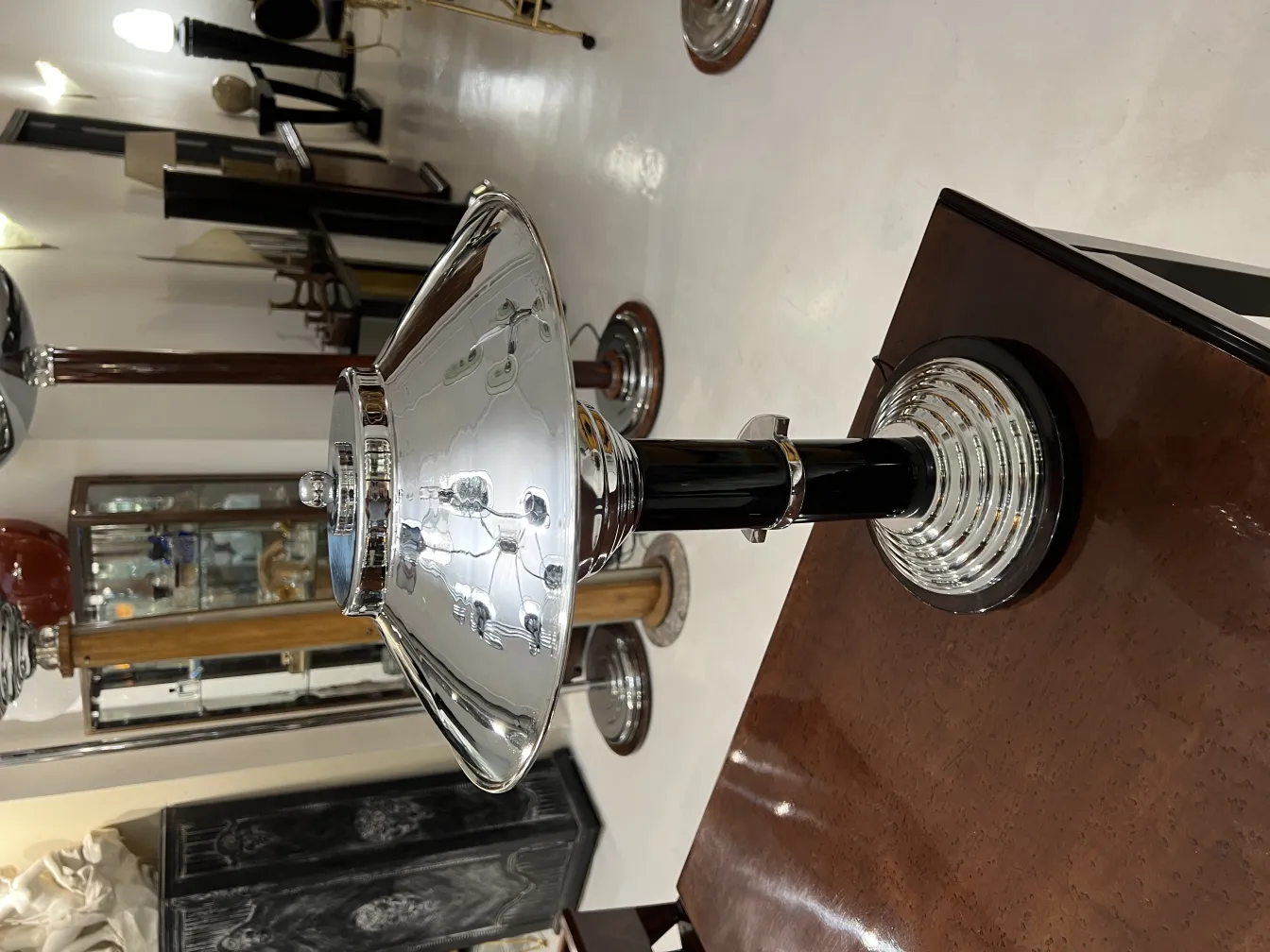 front view of two elegant antique table lamps, shiny