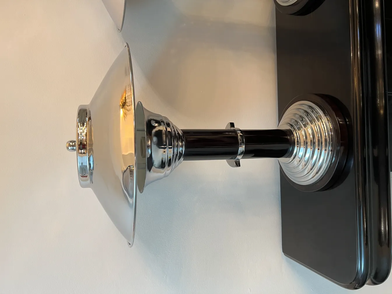 Two antique table lamps with a shiny and elegant finish