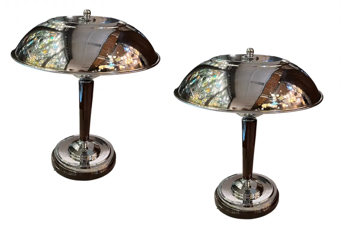 two antique table lamps with shiny decorative details