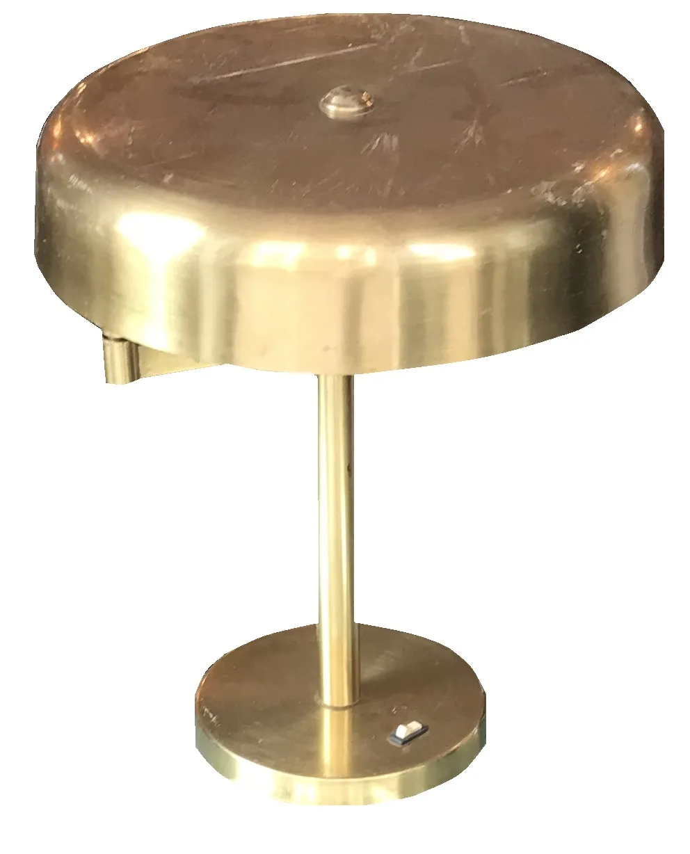 two antique table lamps with a shiny metallic finish, warm ambiance