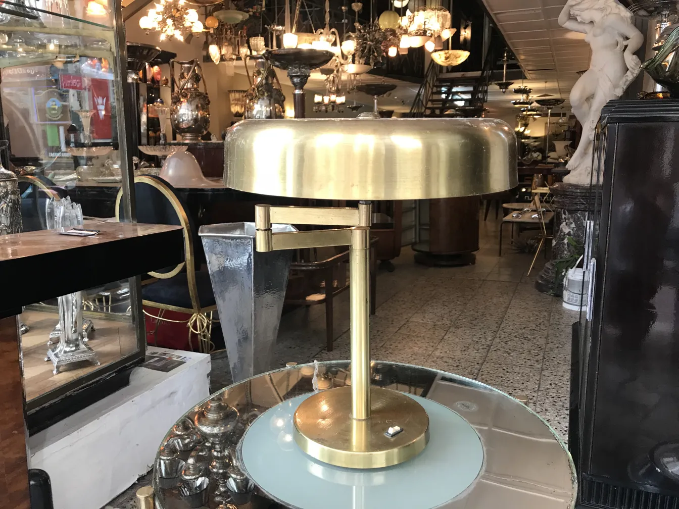Antique table lamps with elegant design and golden base on countertop