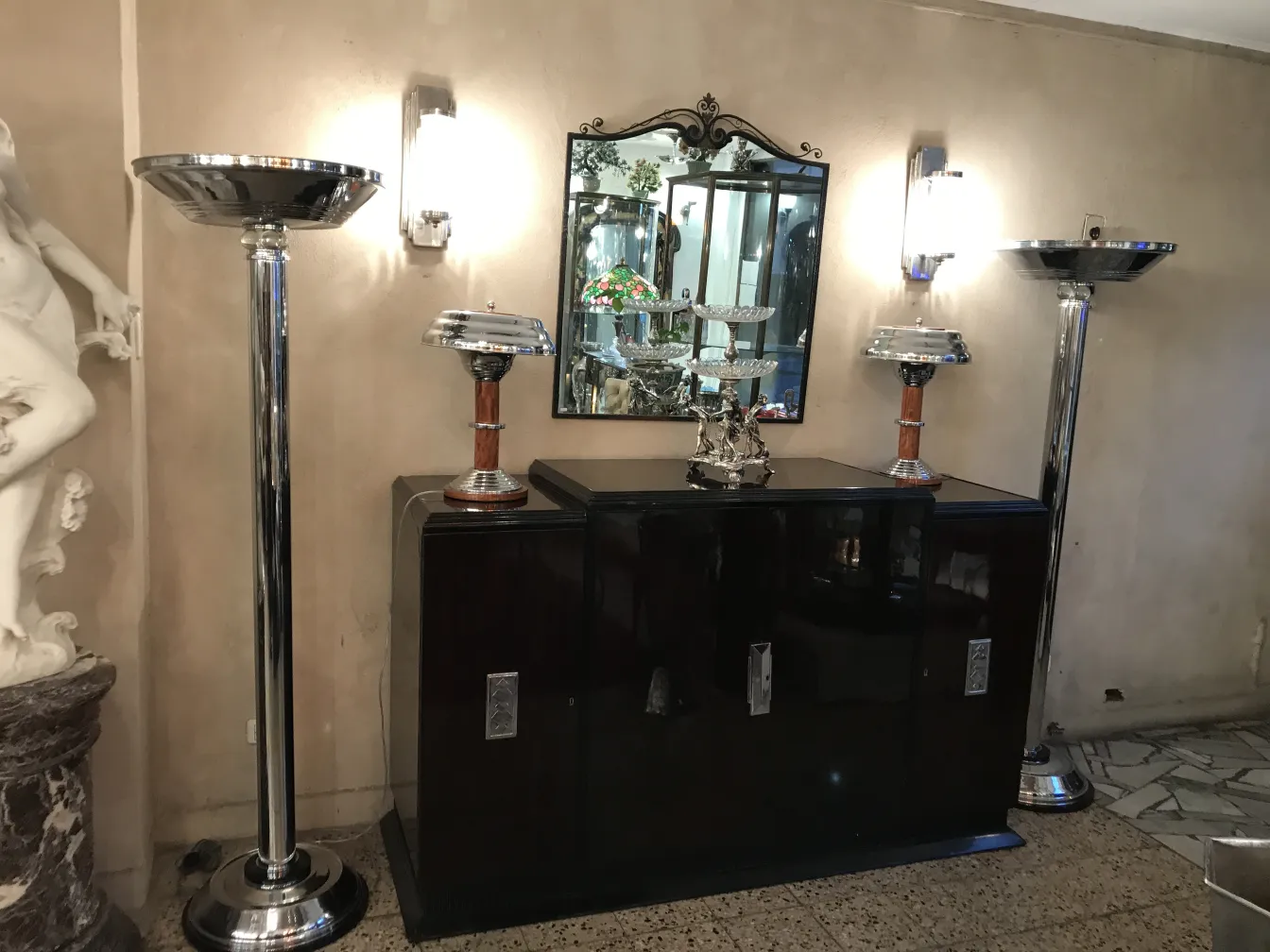View of two antique table lamps with metal base in an elegant setting