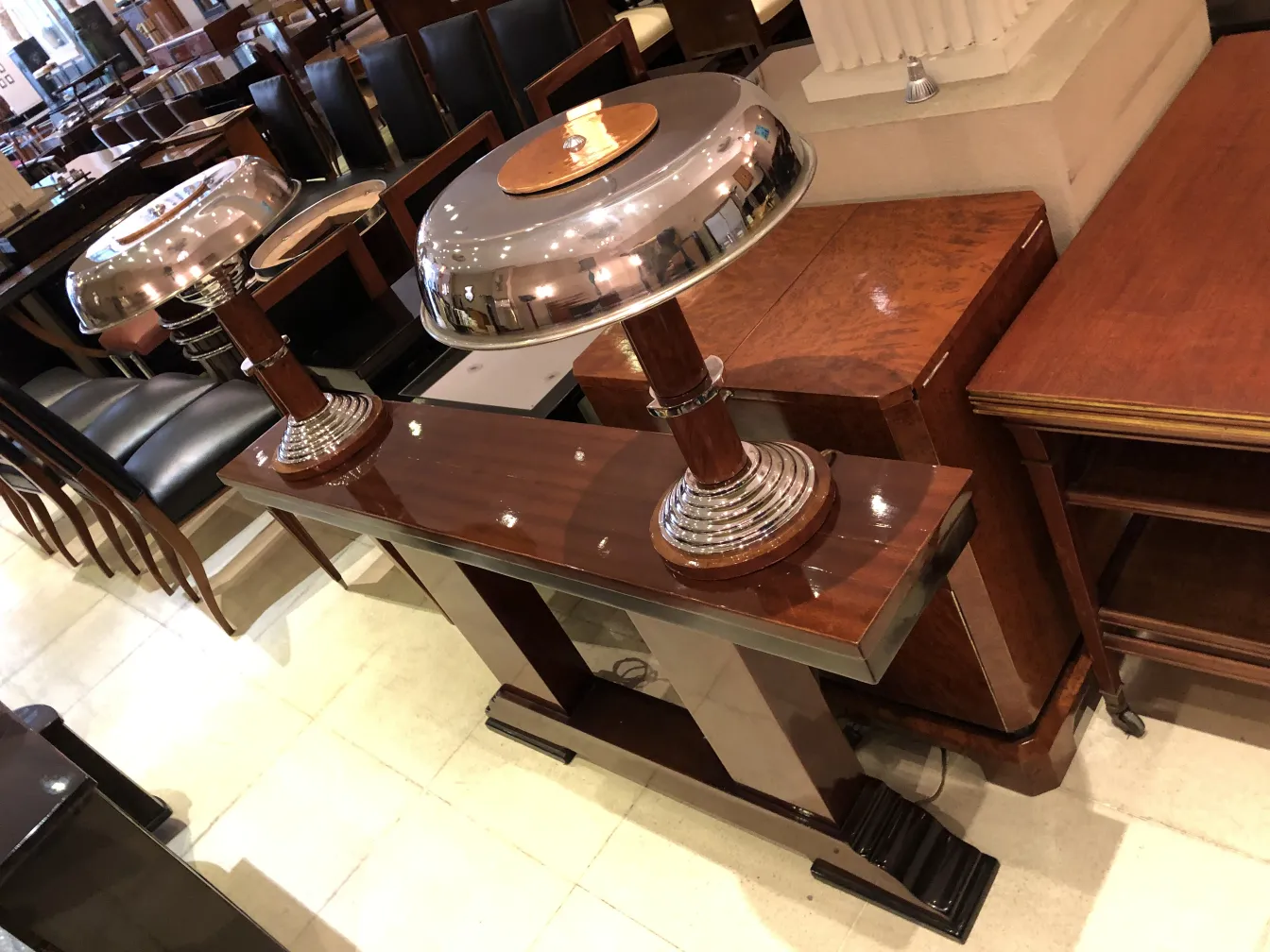 two antique table lamps with elegant design in a classic furniture setting