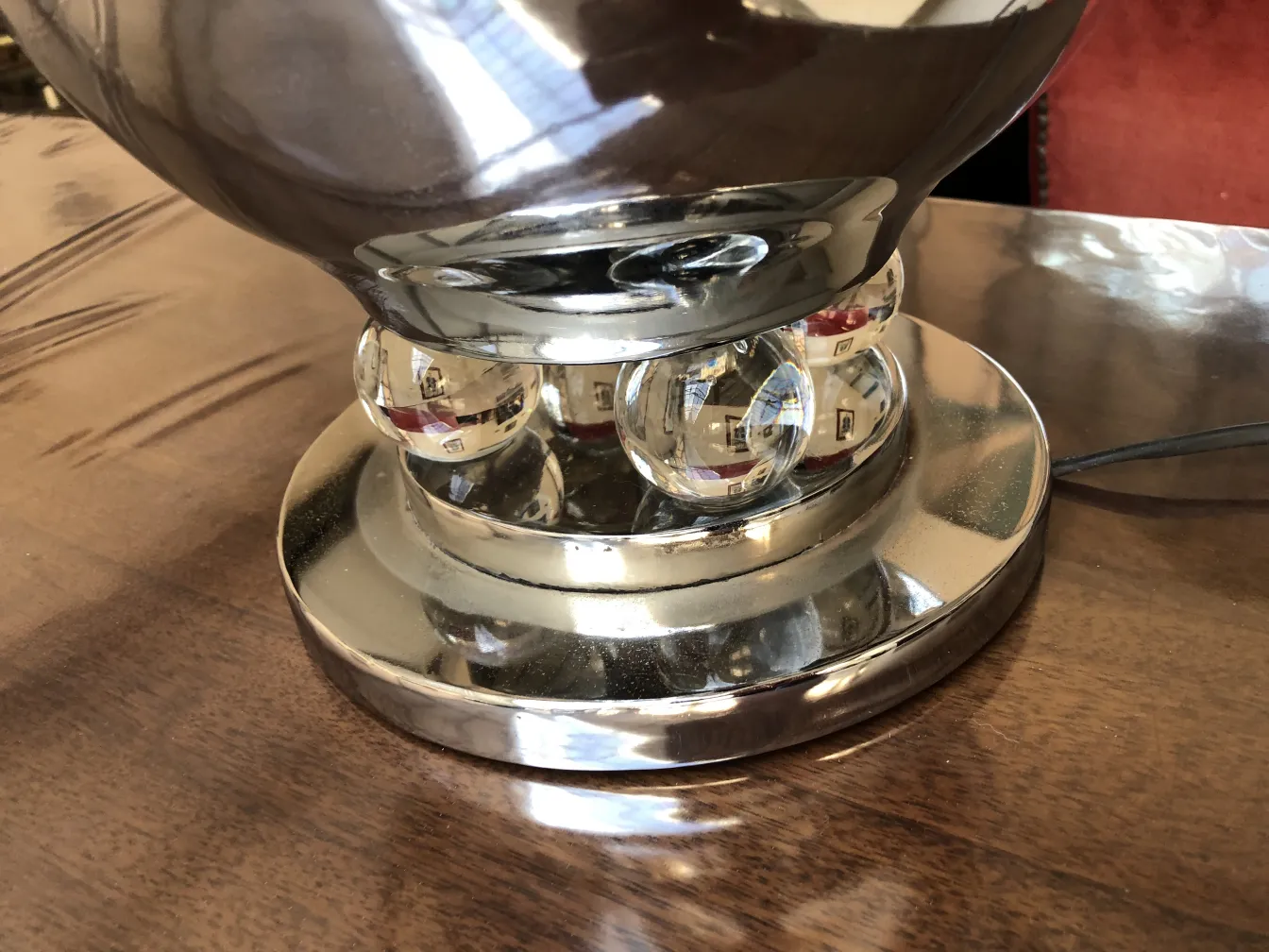 Detailed view of 2 antique table lamps with distinctive base and cozy setting