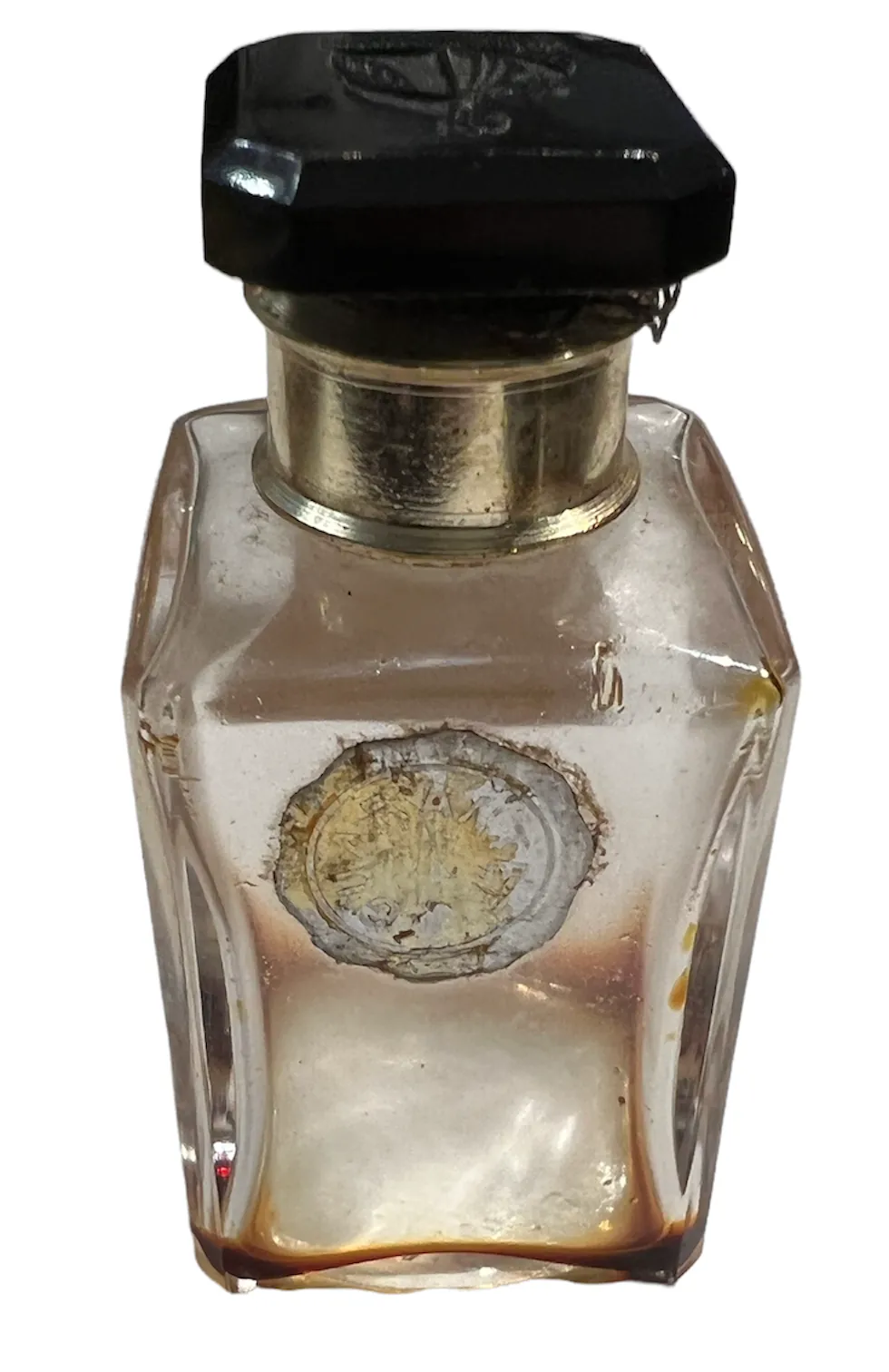 antik-parfümflasche mit achteckigem Deckel und Etikett