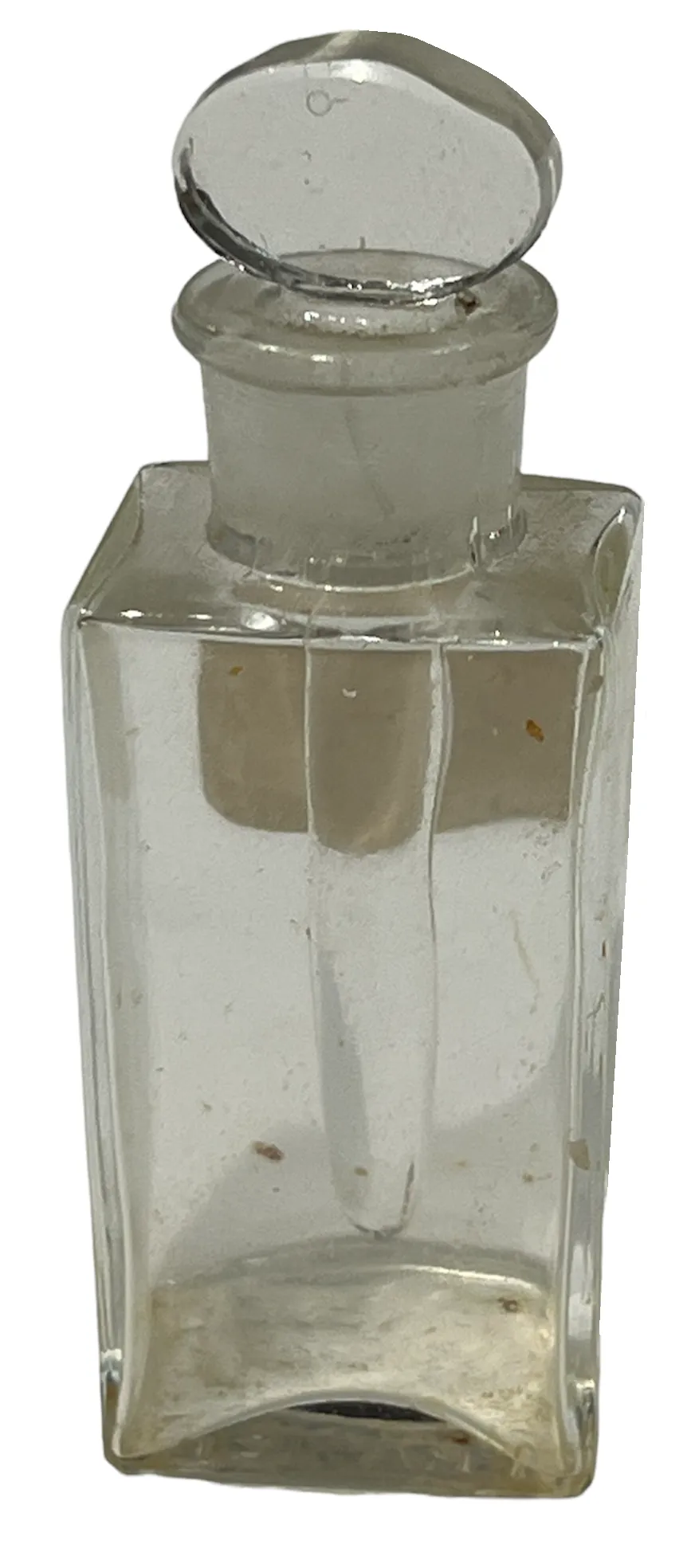 Flacone di profumo antico in vetro, forma rettangolare, tappo rotondo.