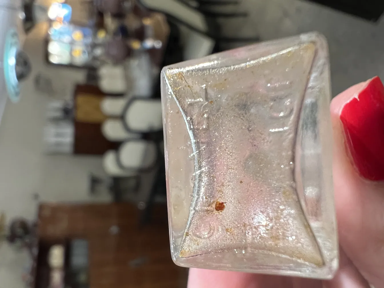 antique perfume bottle with visible details and cozy environment