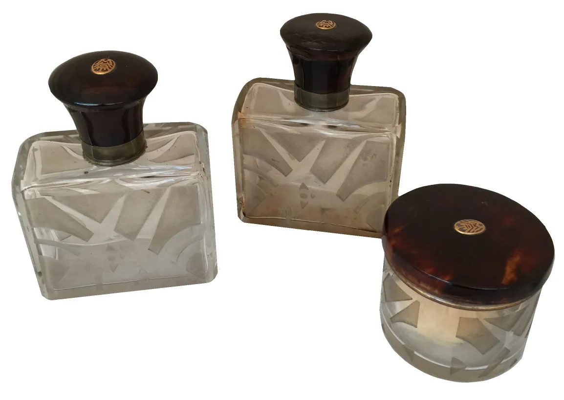 antique glass perfume bottle with decorative lid