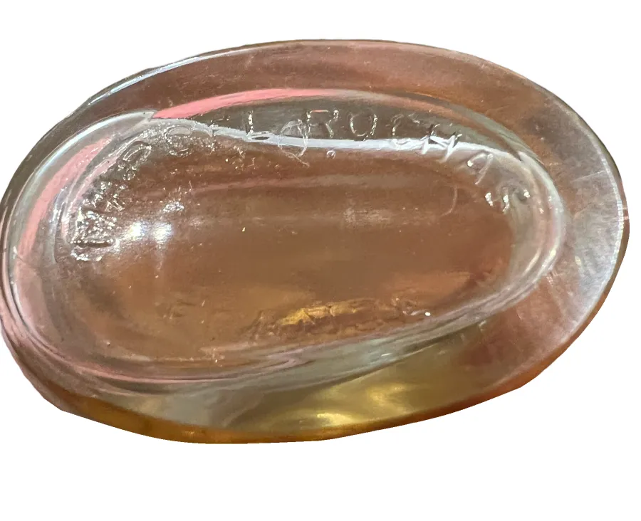 antique oval translucid perfume bottle.