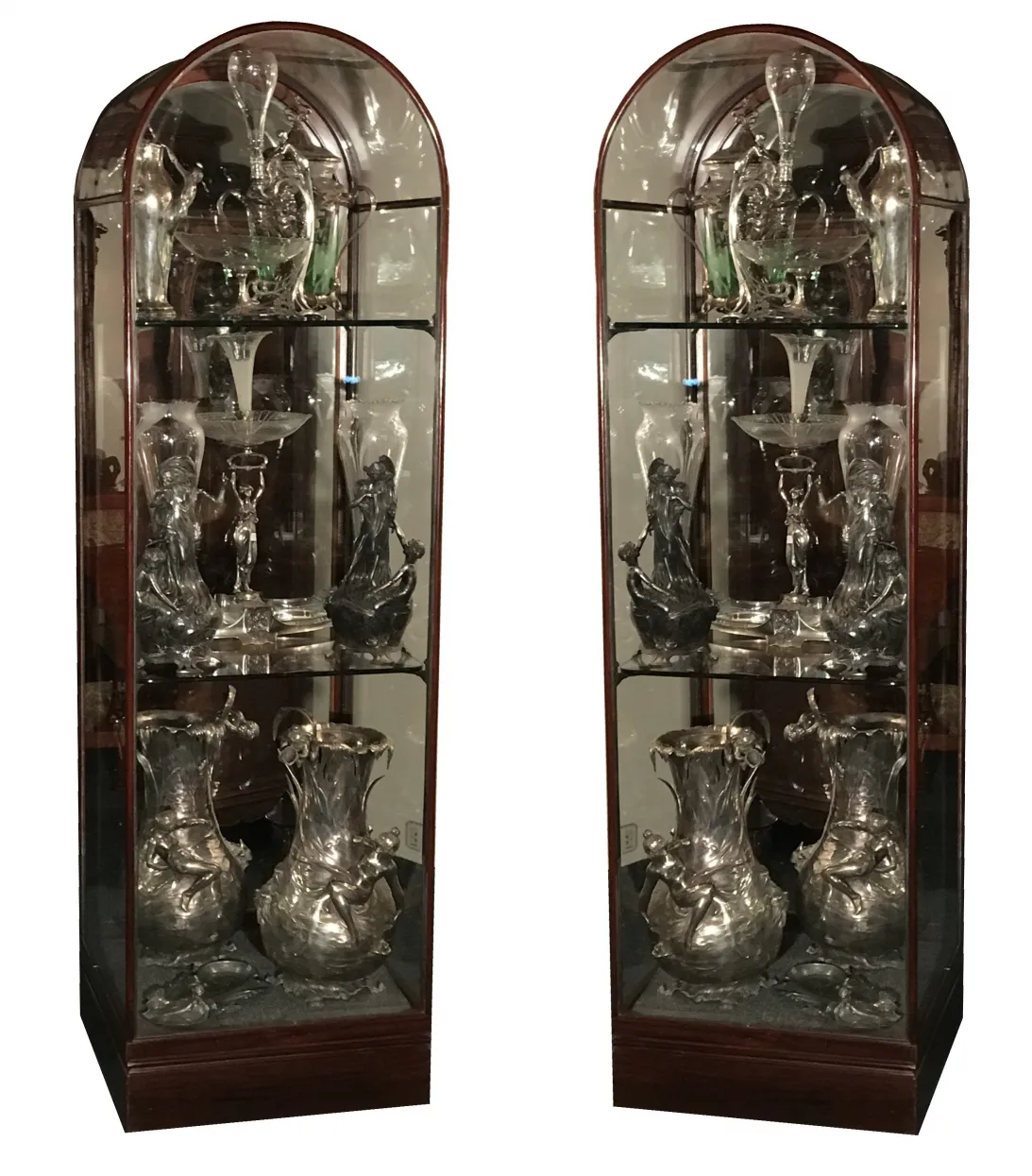 antique display cabinet showcasing decorative glass items