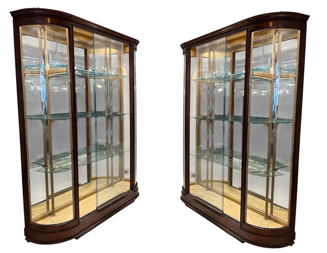 antique display cabinet with curved design, perfect for showcasing