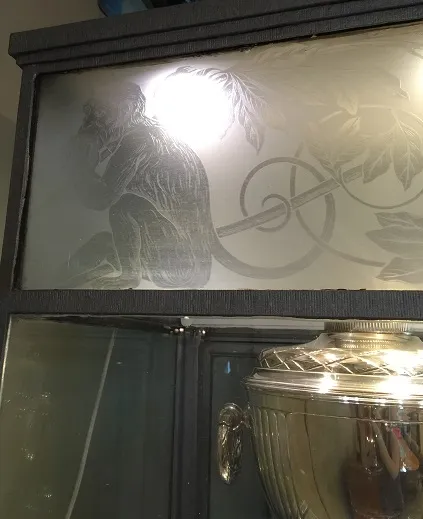 antique display cabinet with etched glass and design