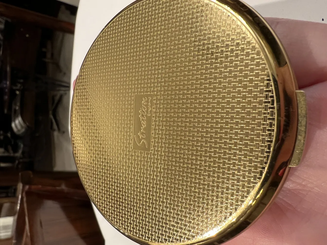 antique gold compact with textured surface