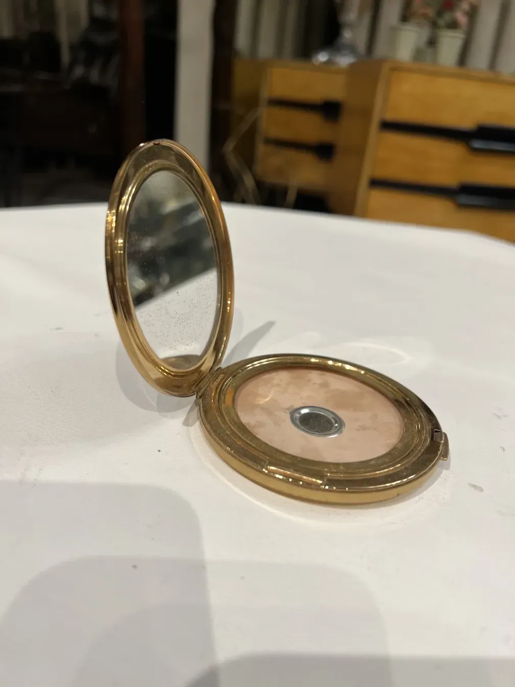 Antique compact Stratton England featuring an inner mirror.