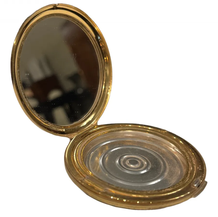 polvera ancienne avec miroir, design ovale et élégant