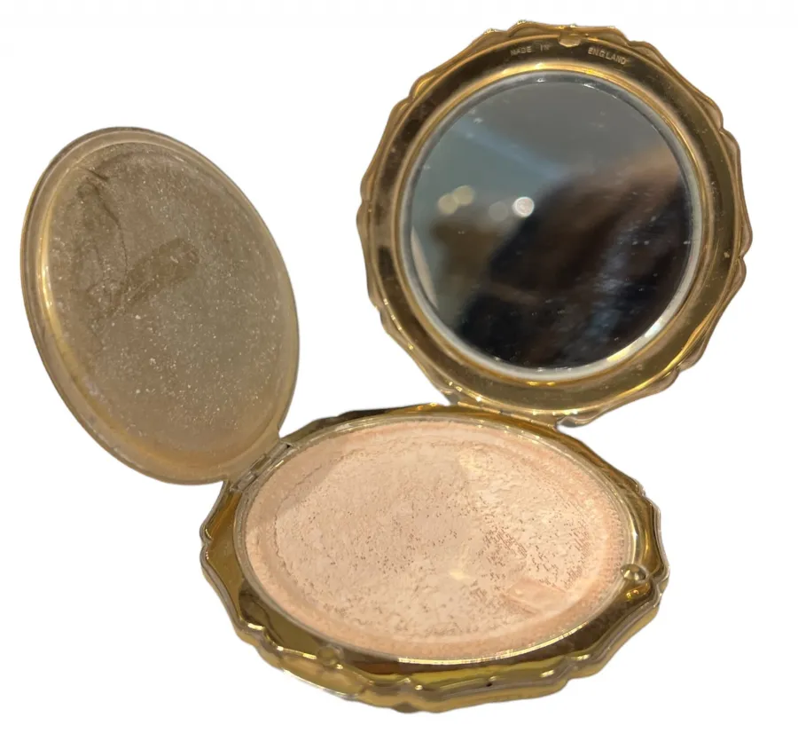 antique compact with gold mirror and soft powder