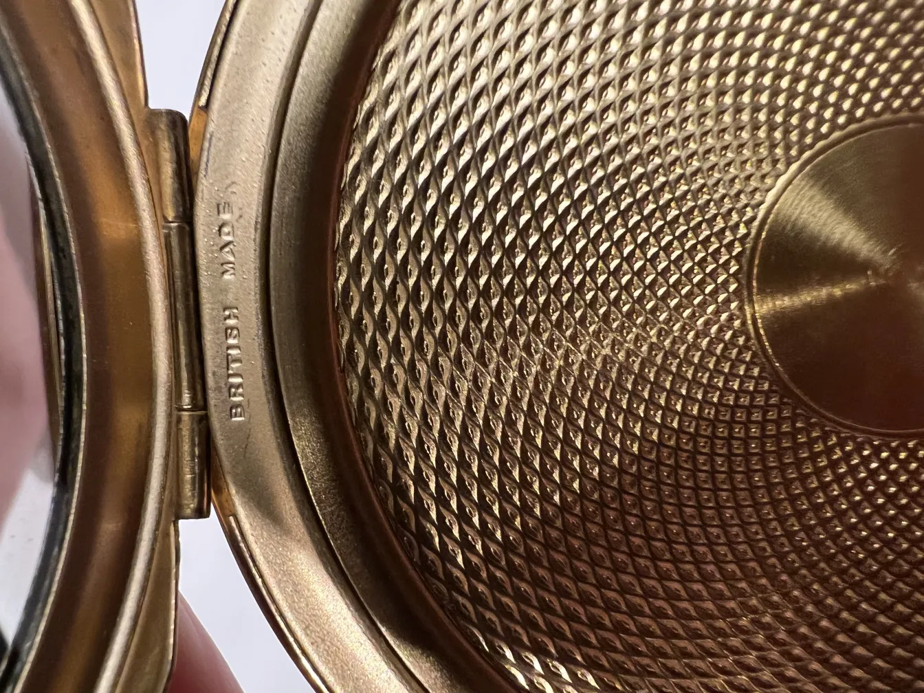 antique compact with elegant design and sophisticated details