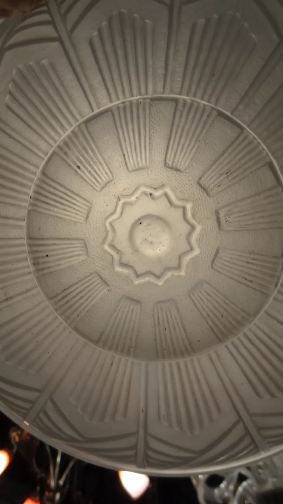 antique ceiling light with embossed patterns, decorative fixture